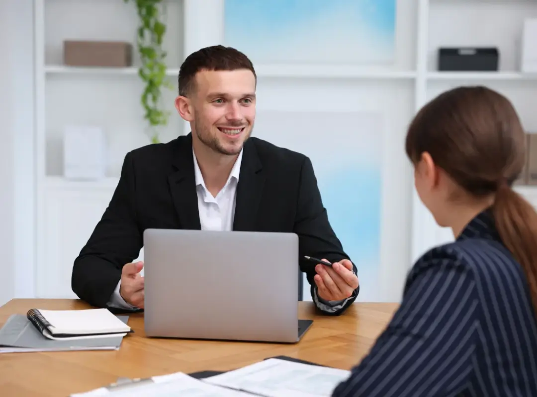 lawyer talking to client smiling